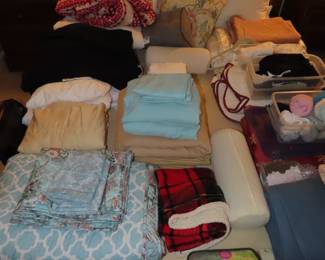 Bed linens, blankets, comforters.