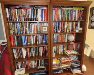 Hundreds of wonderful hard backs and paperbacks, amazing selection, and two bookcases.
