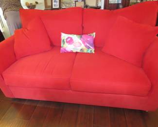 Red fabric sofa.