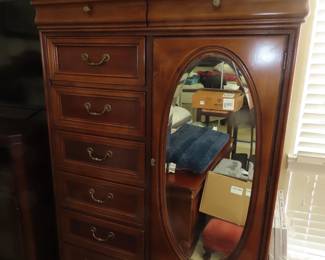 Tall 8 drawer clothing chest with shelves.