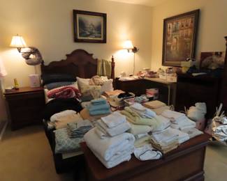 Bedroom area, sheets, towels, blankets and comforters.