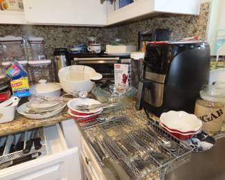 Kitchen. Air fryer, toaster oven, flatware, Oxo storage cannisters, Pyrex and vintage Corningware.