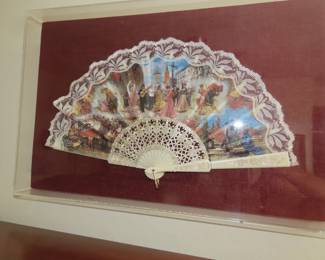 Spanish fan framed in a lucite box.