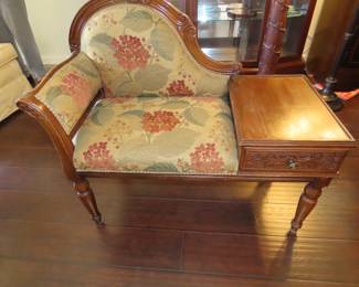 Antique telephone table/seat.