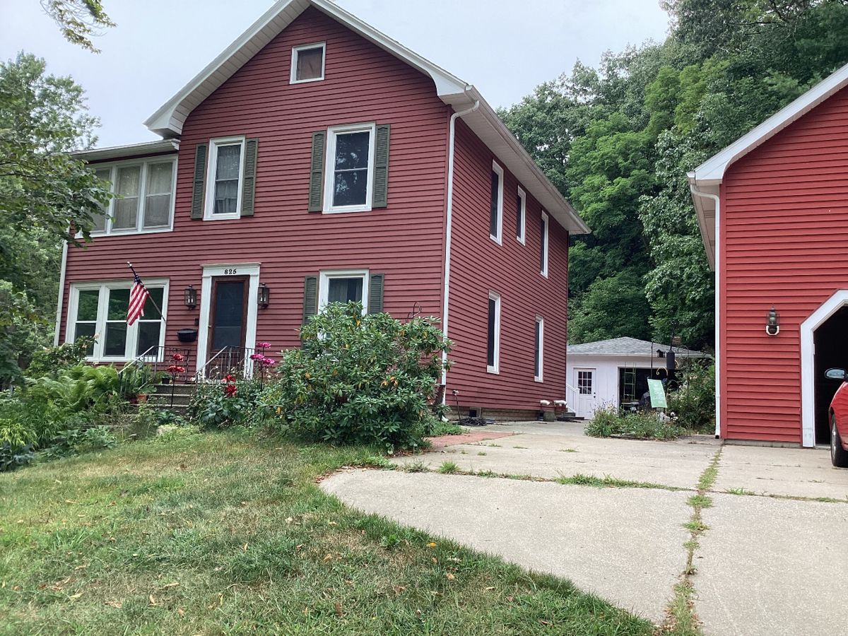 Original Duncan House - three levels. Also 2 large outbuildings.