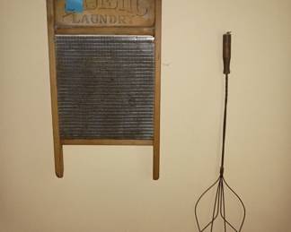 Vintage washboard and rug beater 