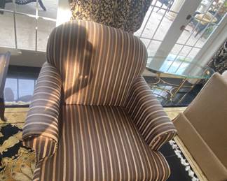 one of two large striped Arm chairs