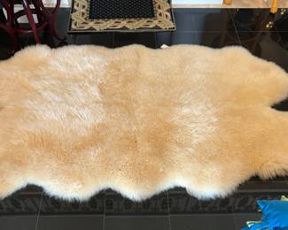 Genuine Lambskin rug 1 of 2. 75" x 45"