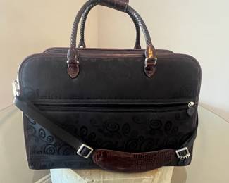 Brighton Weekender, Chocolate Leather and black paisley fabric outside with silver accents, adjustable shoulder strap, zippered on all 3 sides, LIKE NEW condition,  19"w x 6" d x 11" h, inside has several pockets & pouches for 3 pairs of shoes, back side has double zippered compartment to slide over pullout out suitcase handle for secure travel, rubber feet on bottom for safety & cleanliness.