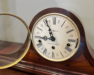 C19 - $60. Howard Miller Mantle Clock. Measures 20.5" wide x 5" deep x 9.5" tall. Battery Powered - not old.