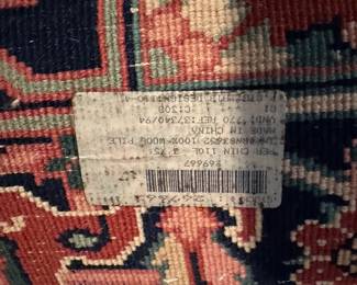 C39 - $60. Wool Throw Rug. Measures 3' x 5'.