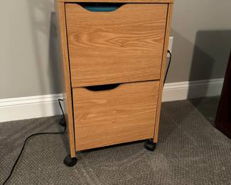 C53 - $20. Pressboard filing cabinet. Measures 15.5" wide x 14.75" deep x 26" tall.