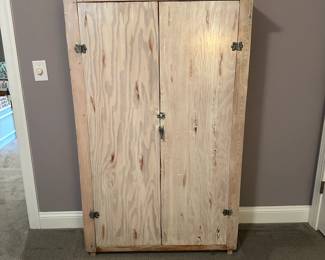 C64 - $150. White Washed Pine Storage Cabinet. Measures 39.5" wide x 12" deep (body) 14.5" deep top lip x 62.5" tall.