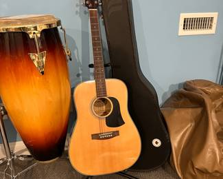 C73 - $125. Aria AW-20N Guitar with Stand and Case. Needs new strings.