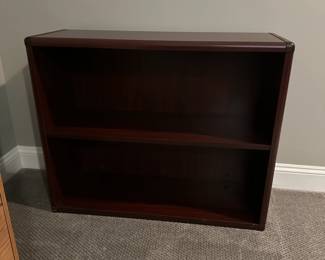 C52 - $40 Bookcase. *2* available. Very dark brown finish. Measures 36" wide x 13" deep x 29.5" tall. Very heavy duty. Has adjustable feet.
