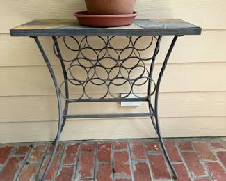 C147 - $35. Side Table on Porch designed for wine bottle storage. Slate top.