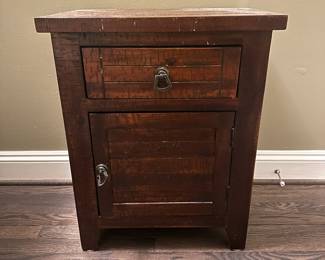 C23 - $45. Small wooden storage cabinet. Measures 20.25" wide x 14" deep x 25" tall.