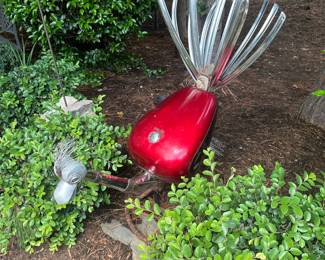C144 - $200 LARGE yard art bird that rocks. Very good condition.