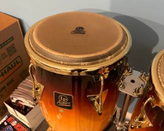 C72 - $250. LP Aspire Double Congas with Stand. Like new condition.