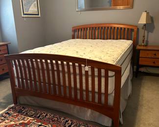 C31- $350. Queen Size Solid Wood Bed Frame. (Includes clean Kingdown Melrose mattress & boxspring if you want them) Measures 63" wide x 87" long x 45" tall headboard.