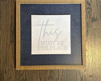 C7 - $10. "This must be the place" wall hanging. Measures 17.5" square.