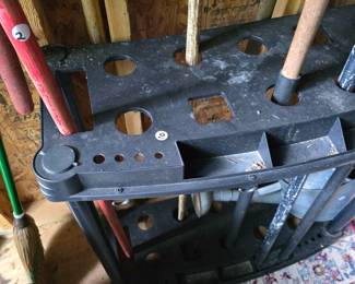 C137 - $10, Plastic Lawn Tool Storage