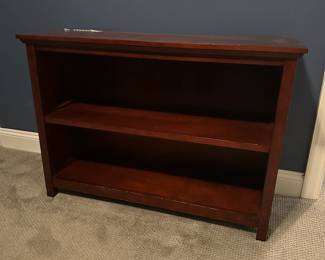 C50 - $75. Pottery Barn Kids Shelf (bookshelf or baskets) Shelf is not adjustable. Measures 42" wide x 13.25" deep x 29.75" tall.