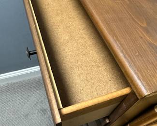 C48 - $40. Small Dresser. Drawers slide. Some knobs need tightened. Body is solid wood. Drawer bases are pressed wood. Measures 26.5" x 15" deep x 41.5" tall.