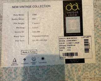 C113 - $50. Unique Loom Area Rug - Measures 7' x 10'. "New Vintage Collection"