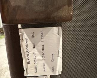 C76 - $350. Dark Brown Leather Chair & Ottoman - Elway Collection by Bassett. Measures 53" wide x 42" deep x 34" tall. Ottoman measures 22" x 29" x 17" tall. In good condition. No holes / rips etc. Super clean. ***Please Note - This item is located on the 3rd floor. Please make sure you arrange for help to get this down and out!