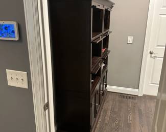 C21 - $250. Dark Wood Storage Bookcase with Barrister Doors (Lift & Slide) Measures 61.25" wide x 20.25" deep x 70.5" tall. Moves in 4 pieces. Top Crown. Each Bookcase. Base.