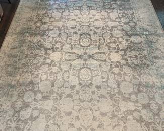 C113 - $50. Unique Loom Area Rug - Measures 7' x 10'. "New Vintage Collection"