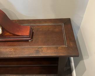 C18 - $125. Bassett Console Table. Measures 41" wide x 16" deep x 30.25" tall. Shows a bit of wear on the edges.