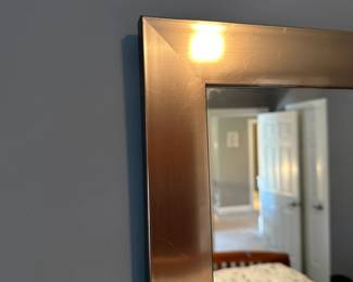 C36 - $25. Mirror with Silver Metal Frame. Measures 54" long x 16" tall.