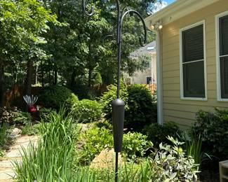 C132 - $40. 4 arm heavy duty bird feeder. 8-10' tall.