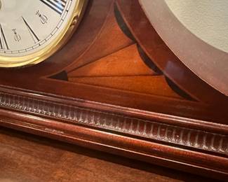 C19 - $60. Howard Miller Mantle Clock. Measures 20.5" wide x 5" deep x 9.5" tall. Battery Powered - not old.