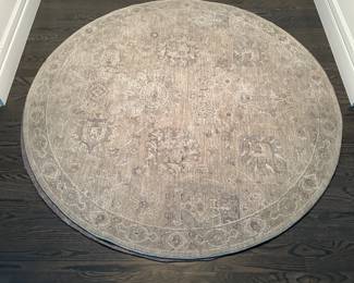 C25 - $65. Surya round area rug 5'3" round. Very good condition and includes rug pad.