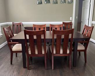 C9 - $550. Ethan Allen Dining Room Table with 8 chairs. Horizons Collection. This photo is with NO leaves in. Measures 42" wide x 70" long x 30.25" tall. Each leaf adds 18" so table extends up to 106". Very good used condition. Shows minor wear I would expect with use. Very sturdy!