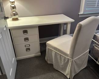 C68 - $300. Pottery Barn Bedford White 3 drawer Desk with chair. Drawers can be on either side! Measures 52" wide x 23" deep x 29" tall.