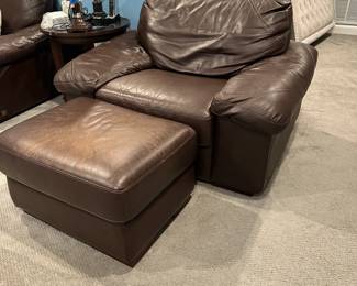 C76 - $350. Dark Brown Leather Chair & Ottoman - Elway Collection by Bassett. Measures 53" wide x 42" deep x 34" tall. Ottoman measures 22" x 29" x 17" tall. In good condition. No holes / rips etc. Super clean. ***Please Note - This item is located on the 3rd floor. Please make sure you arrange for help to get this down and out!