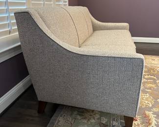 C1 - $600. Bassett Furniture Couch. Purchased Fall 2021. Measures 78" long x 34" deep x 33.5" tall. EXCELLENT CONDITION. No issues noted. Tweed grey fabric. Was used very gently in formal living room.
