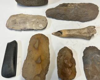 Scrapers, grinding stones