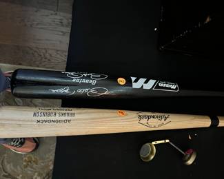 Brooks Robinson and Pete Rose autographed bats