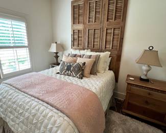 Bedroom with antique shutter headboard 
