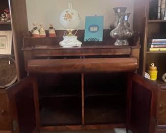 Carved sideboard cabinets and drawers open
