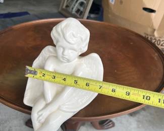 Moody Cherub ;) - $20