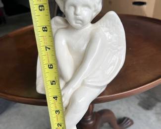 Moody Cherub ;) - $20