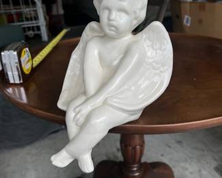 Moody Cherub ;) - $20
