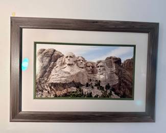 Framed Mt. Rushmore artwork.