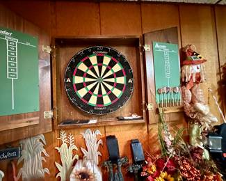 Wall mounted Accudart cabinet dartboard.